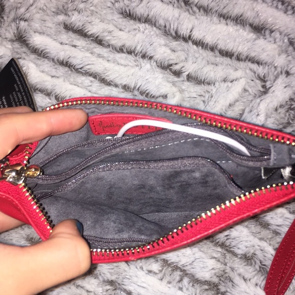 Red wallet with a built in portable charger - Picture 2 of 4